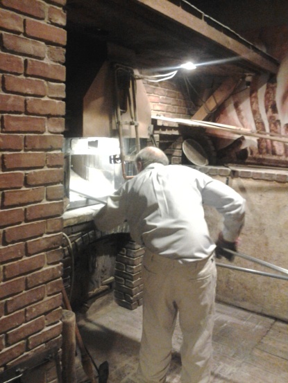 Gerard preparing to load the oven for firing.